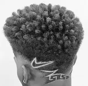 Low Fade and Intricate Hair Design