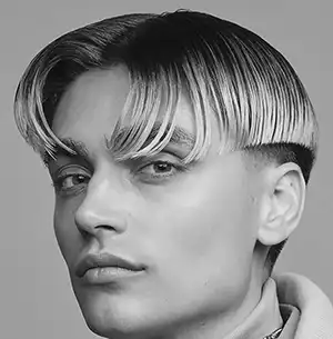 middle part with faded sides hairstyle